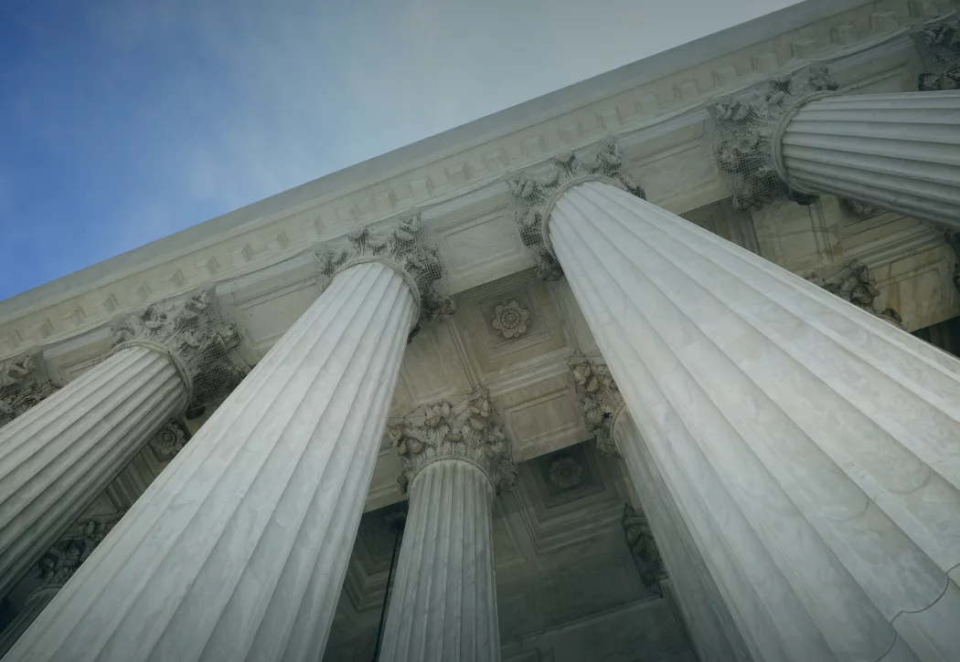 Image of Columns of a Building as Viewed Looking Up from the Street